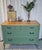 This antique French provincial style dresser, Burl Wood, customized on a custom green color, heavily distressed and wax...