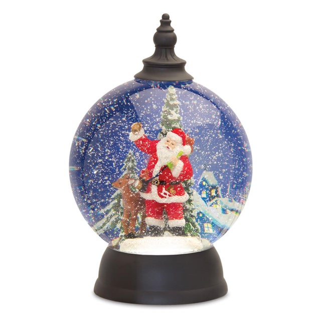 Bring the magic of Christmas into your home with this enchanting LED Santa in Sleigh Snow Globe. Featuring a beautifully...