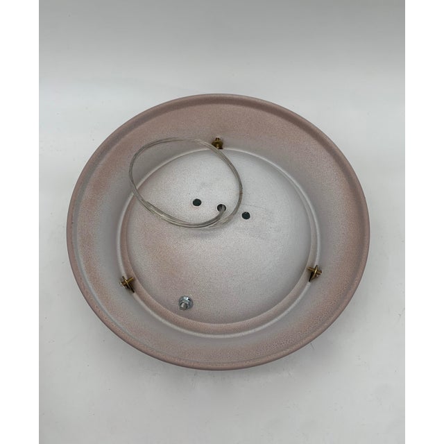 Lamps attributed to Fontana Arte. Sold as a pair. Ceiling or wall lamp, featuring a simple and functional design typical...