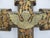 Wonderful Mexican folk art Milagros hand carved wood cross. The surface is densely covered with small, stamped brass and...