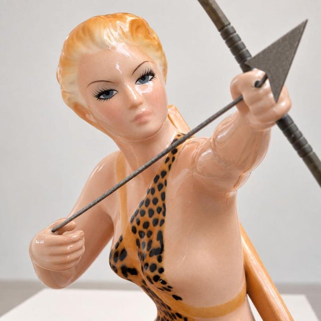 An elegant 1950s Italian polychrome glazed ceramic sculpture of Diana the Huntress, created by Favaro and Cecchetto. The...