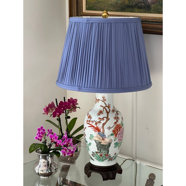 Chinese porcelain table lamp with new shade. Pretty chinoiserie decoration. I selected a blue shirred fabric shade to give...