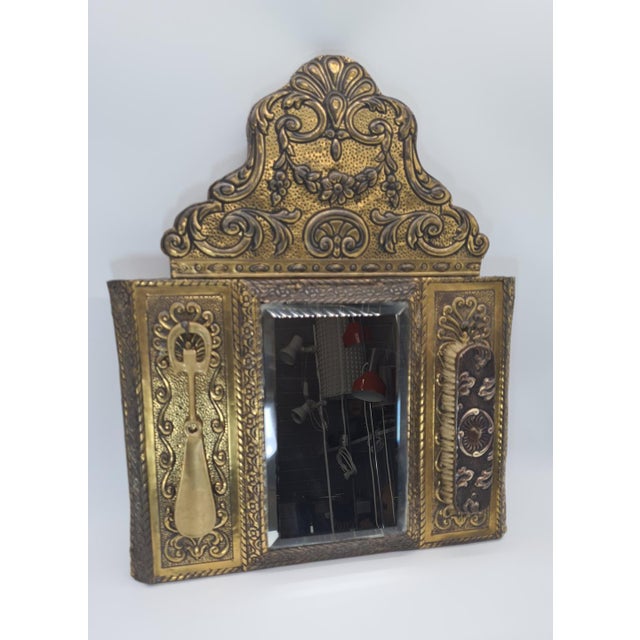 An elegant, decorative wall mirror in the Napoleon III style, made in France in the second half of the 19th century, most...
