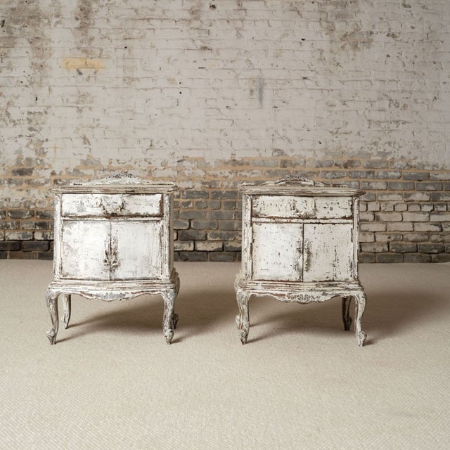Bring effortless French charm to your home with this 19th century French oak bedside table set, a beautifully matched pair...
