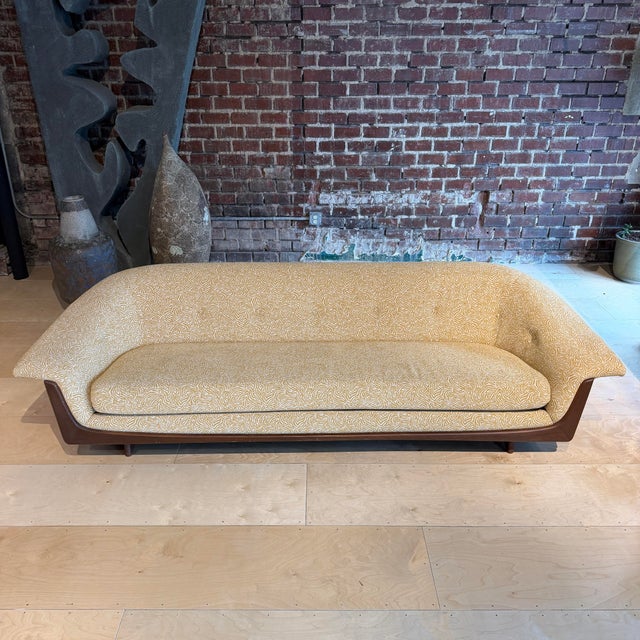 Reupholstered gondola sofa in the style of Adrian Pearsall but not sure of the manufacture. I haven’t seen another like...
