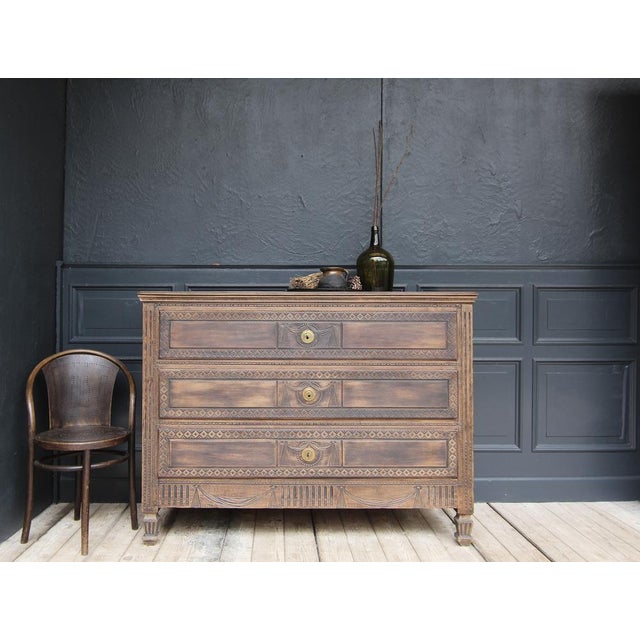A provincial classicist Louis XVI chest of drawers. West German, around 1800. Made of solid oak with original patina....
