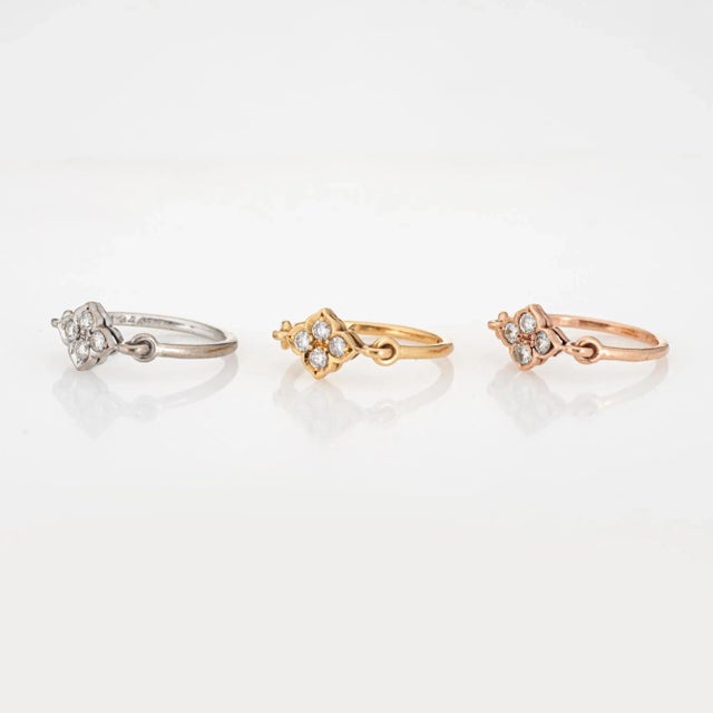 Pre owned set of 3 Cartier Hindu diamond rings crafted in 18 karat white, rose and yellow gold. Twelve round brilliant cut...