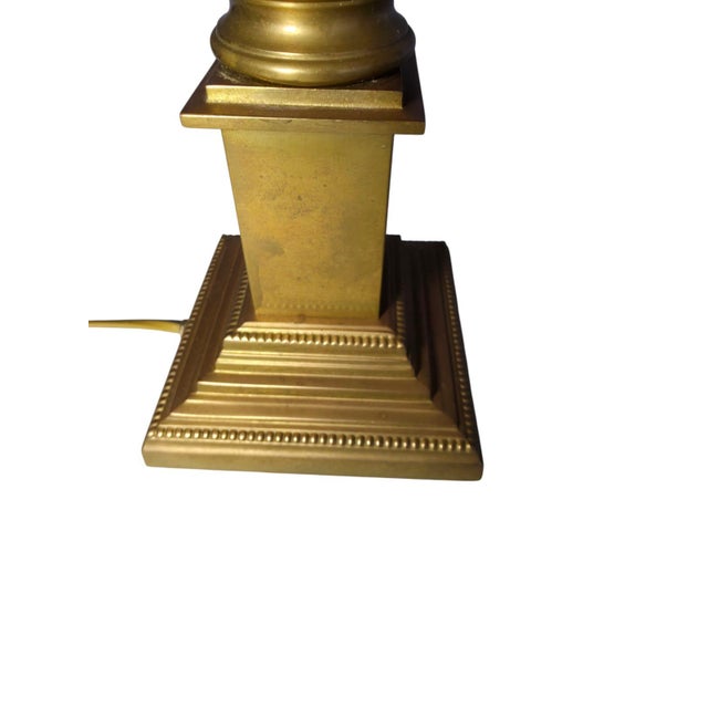 An elegant pair of Laura Ashley Home table lamps in a neoclassical style. These timeless lamps combine British design with...