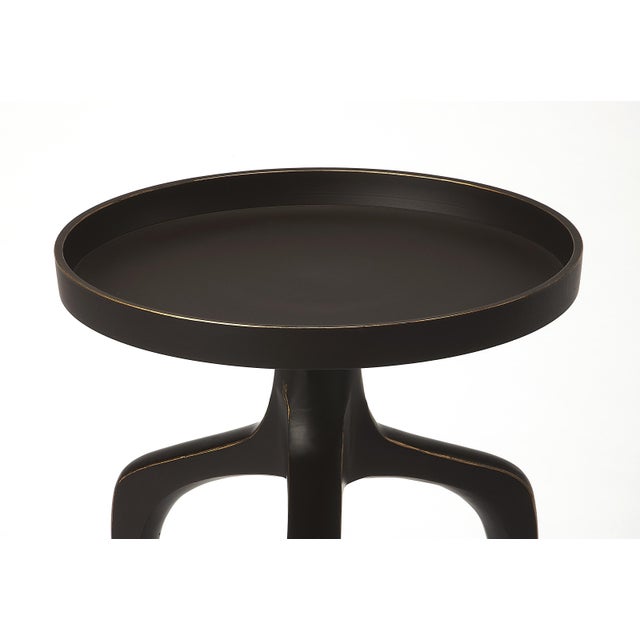 Three round tables cast slim silhouettes together in space-saving elegance. Each top is at a slightly different height,...