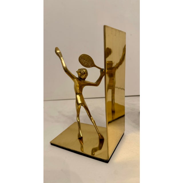 Pair Of Large Solid Brass Tennis Players Bookends. Nice detail in casting of two players, heavy weight with substantial...