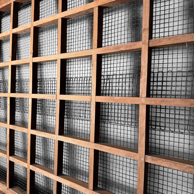This large, original Japanese sliding door combines an open lattice with metal mesh and a solid lower section, giving it a...