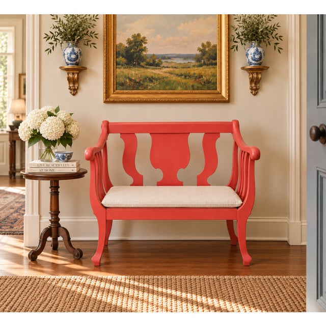 Antique American Classical Grecian-style settee, circa 1825–1840, featuring a shaped open back, sweeping scrolled arms,...