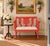 Antique American Classical Grecian-style settee, circa 1825–1840, featuring a shaped open back, sweeping scrolled arms,...