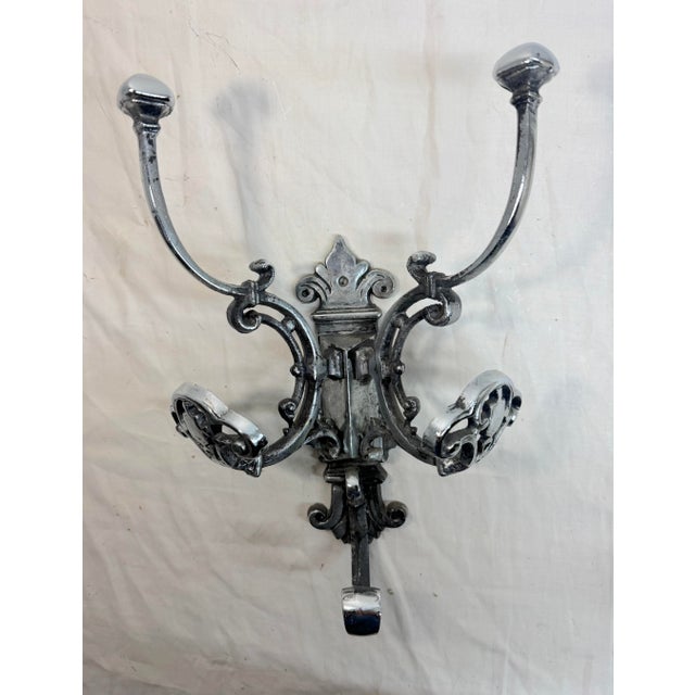 This vintage ornate heavy chrome wall mount wall hook is a stylish and functional addition to any home. With a sleek...