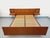 Vintage Scandinavian-style double bed from the 1960s, made of teak, with integrated headboard, frame, footboard, and...