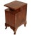 This very elegant Italian Baroque bedside table in solid walnut and walnut veneer was made in the 1920s.