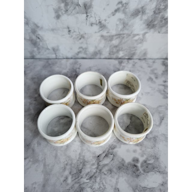 Set of 6 vintage fine bone china napkin rings decorated with delicate yellow blooms and branches. A beautiful addition to...