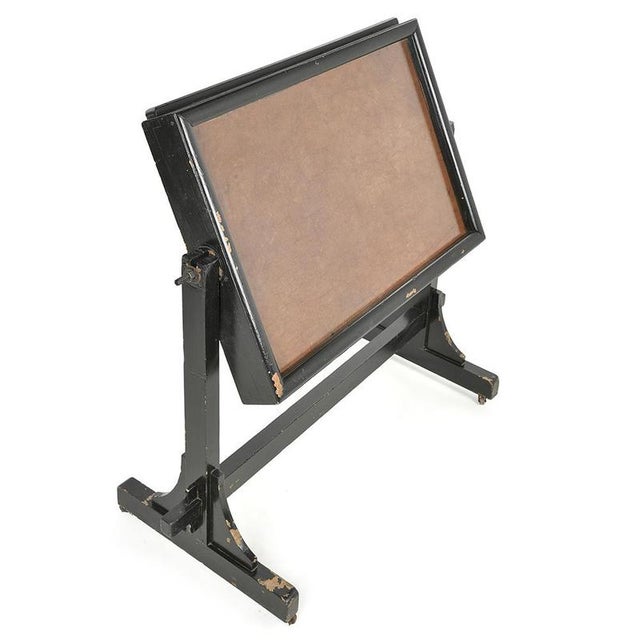 This antique wall display case, mounted on a painted wooden base, seduces with its functionality and visual presence. with...