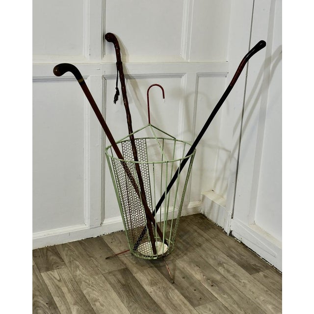 Retro Chic 50s Umbrella Shaped Umbrella Stand An unusual and attractive piece, made in wirework in the shape of a slightly...