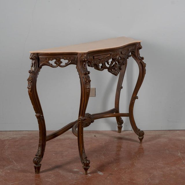 Carved console table top in pink marble baroque style made in the 20th century measures 128 x 35 x h 85.5 plus spec 152...
