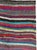 This mid-20th century Persian flatweave kilim rug is a vibrant celebration of color and movement, woven in the traditional...