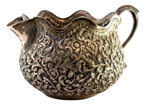 Silver Gravy Boat with Embossed Floral and Plant Motifs