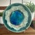 Stunning vintage McCarty Pottery plate in the Dark Jade Waterbottom with Edge colorway. The center has layered blue, teal,...