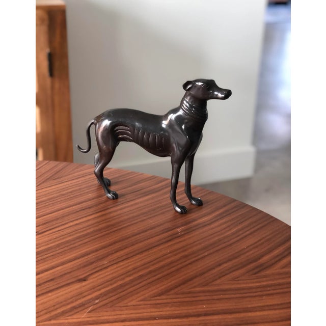 Greyhound lover? Art Deco lover? You can’t go wrong with this fleet footed heavy vintage piece. Elegant in it's...