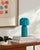 Illuminate your space with the Umbra accent table lamp, a beacon of minimalist modern style. Standing at a sleek 10 inches...