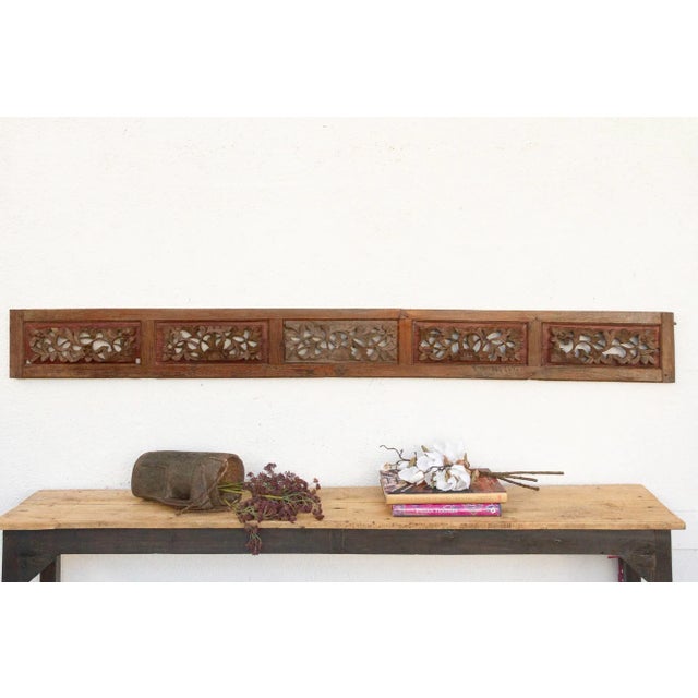 Invite a piece of profound history and breathtaking artistry into your home with this magnificent antique, finely carved...