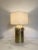 Totally brass brushed and glow painted for this impressive table lamp . Butterfly trasparent Murano glass and ivory...