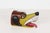 Vintage hand-carved wood mask in the form of a stylized dog or coyote, carved from a single hollowed log section in the...