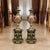 Elevate an elegant interior with this exceptional matching pair of decorative porcelain vases with coordinating pedestals,...