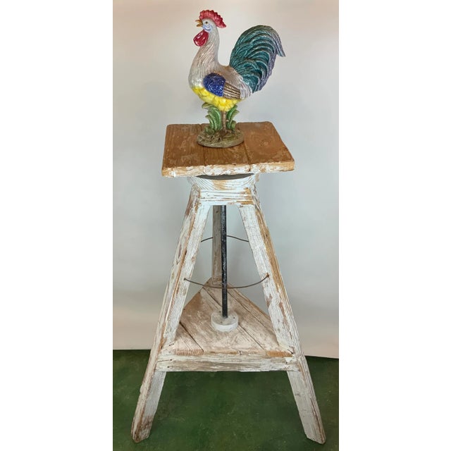 This impressive sculptor's stand features a elegant revolving top that allows for 360 degree views. Originally used as a...