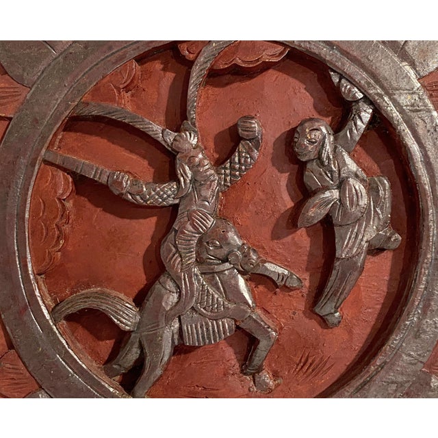 This stunning antique wall panel is made of hand carved wood and features a high relief design from Chinese culture. With...