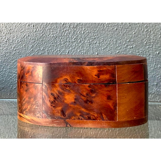 This exquisite vintage oval trinket box is a masterclass in organic texture and geometric form. Crafted from richly...