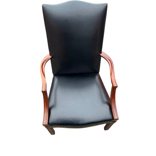 Hancock Moore known for quality and style . The stately armchair will make a nice addition to any room.