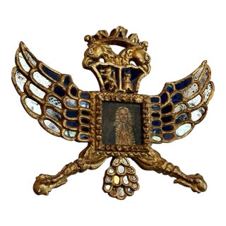 Spanish Colonial Giltwood Heraldic Mirror Frame With Portrait, Late 18th/Early 19th Century For Sale