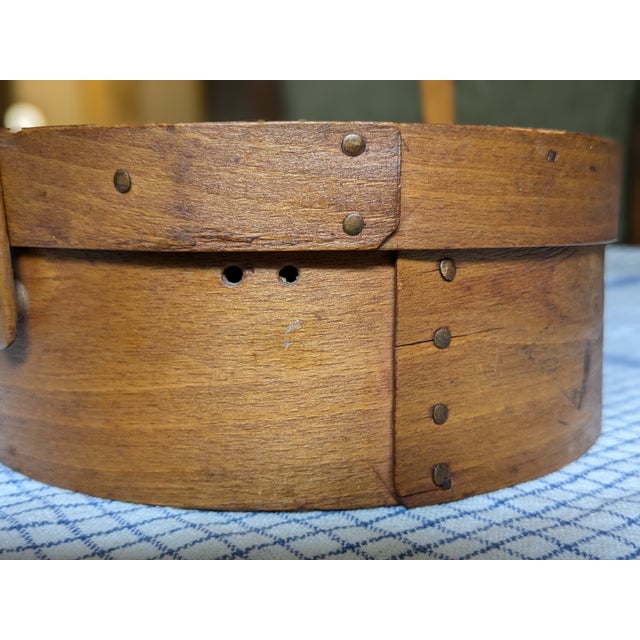 This original Shaker Pantry Box was acquired in the early 1970’s at an auction of Shaker items in Massachusetts. The. box...