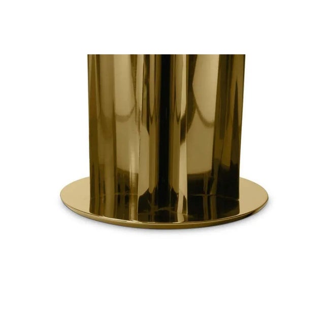 Table lamp in polished brass Made of gold-plated brass. Custom sizes, materials and finishes\. Dimensions Height 27.56 in....