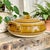This Vintage Studio Pottery Small Casserole Dish in a warm mustard-brown hue is a perfect blend of rustic charm and...