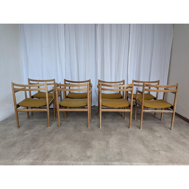 Set of 8 vintage wooden dining armchairs manufactured by STOL Kamnik in former Yugoslavia around the 1960s–1970s. Chairs...