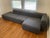 Hay Mags Low Sectional, 1 arm wide with chaise, right orientation, 3 sections. Charcoal Mode fabric upholstery. The center...