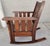 Unusual and fine Mission Oak / Arts & Crafts rocking chair. Circa. 1910. Crafted with through tenon and peg construction....