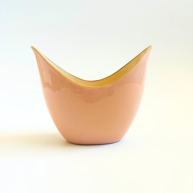 A vintage porcelain vase or planter from the Crescent Collection by Lenox. Lovely shape with a blush pink glaze and gold...