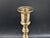Lovely pair of brass candlesticks made in Portugal. Mirrored finish, there are a few scratches around the top.