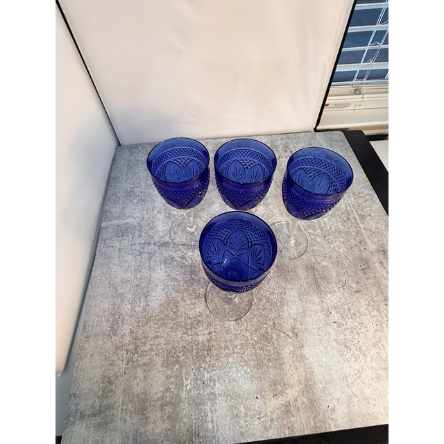 A magnificent, matching set of four (4) vintage water goblets in the iconic "Longchamp" pattern by celebrated French...
