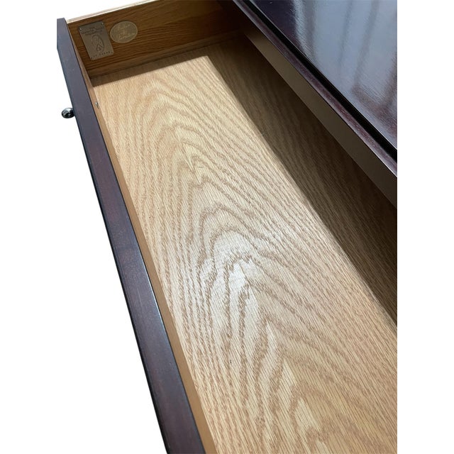 Pair of Barbara for Baker Furniture end tables or night stands. Made of solid mahogany in a Java finish with nickel...