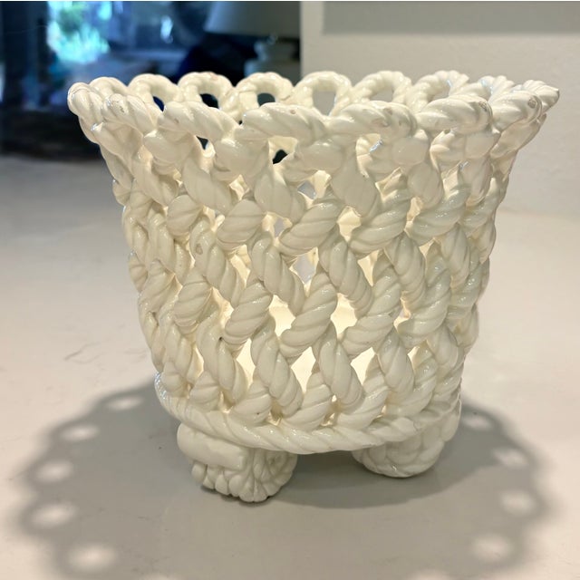 This white ceramic cache pot is so fabulously 1960s. It takes it shape from white ceramic "rope" loosely woven into the...