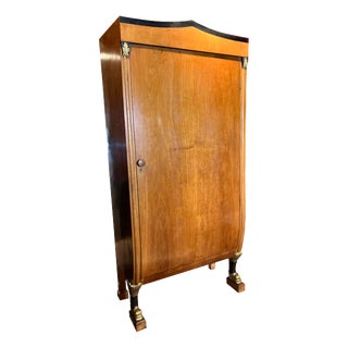 19th Century Biedermeier Fruitwood Armoire with Dolphin Carvings and Gilt Detail For Sale